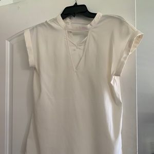 White slight cream color express top